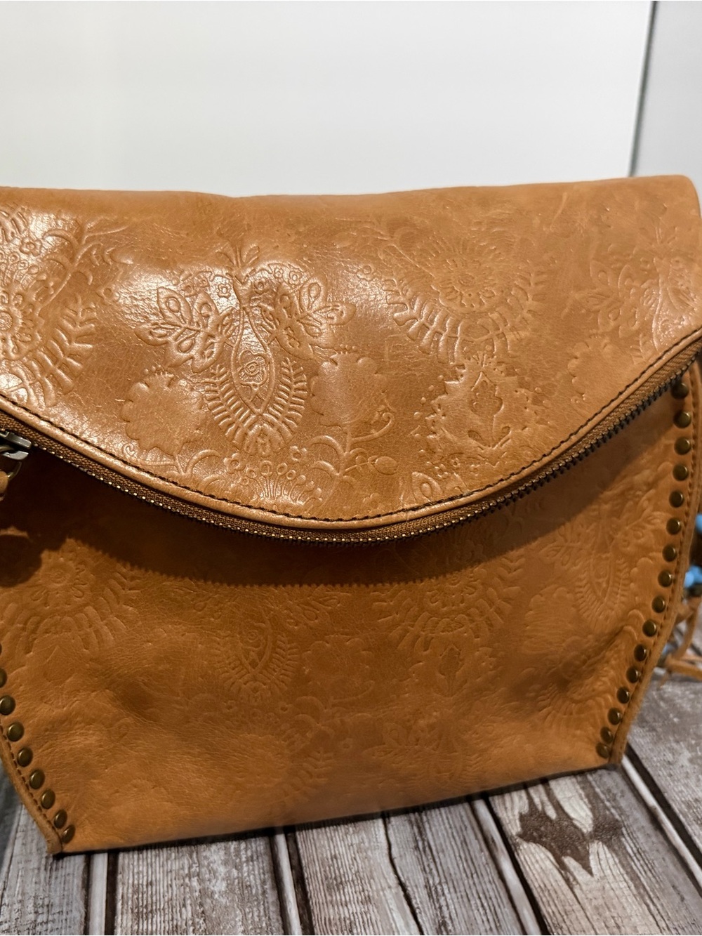 The Sac Silverlake Leather Crossbody Bag in Tobacco Floral Embossed (Cognac)